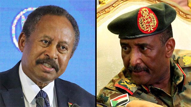 El primer ministro sudanés, Abdalla Hamdok, y el presidente del Consejo Militar de Transición, Abdel Fattah al-Burhan. 