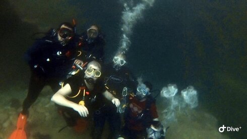 Buceo conjunto de diplomáticos. 