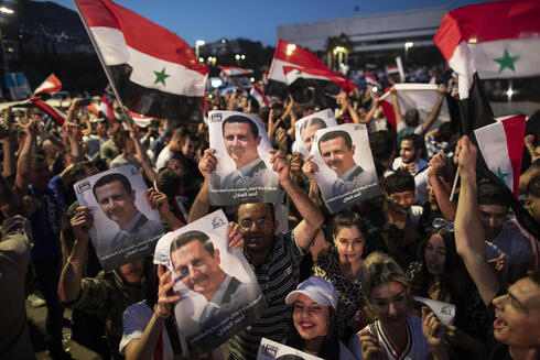 Manifestación de partidarios del presidente sirio Bashar Al Assad. 