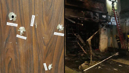 Los agujeros de bala en la puerta y la cafetería quemada. 