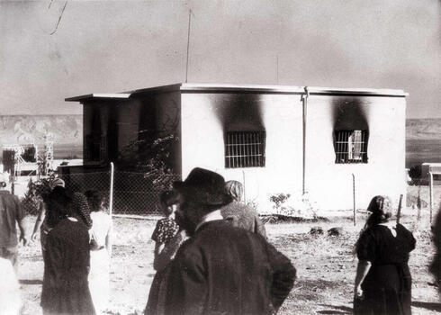 Una casa quemada con su familia adentro durante la masacre. 