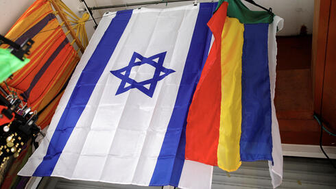 Las banderas israelí y drusa.