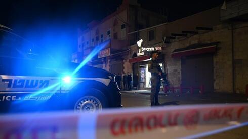 La policía en la escena del asesinato en una comunidad árabe del norte.