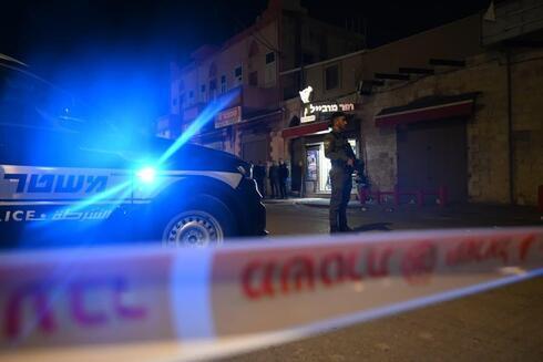 La policía en la escena del asesinato en una comunidad árabe del norte.