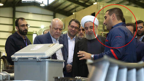 Ayoob Entezari con el entonces presidente iraní Hassan Rouhani. 