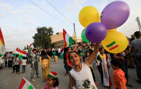 Niños kurdos durante una protesta en Irak. 