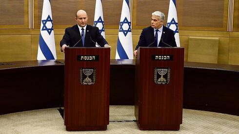 Naftalí Bennett, primer ministro de Israel, y el ministro de Relaciones Exteriores, Yair Lapid. 