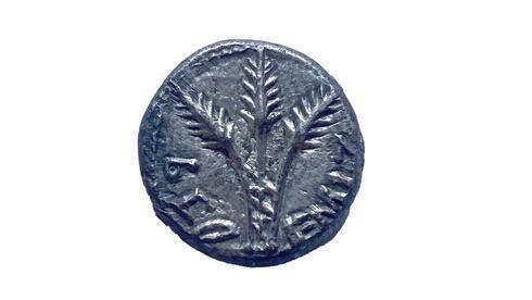 Moneda de un cuarto de shekel descubierta en excavaciones anteriores. (Autoridad de Antigüedades de Israel) La moneda cuyo valor es de un cuarto de shékel.