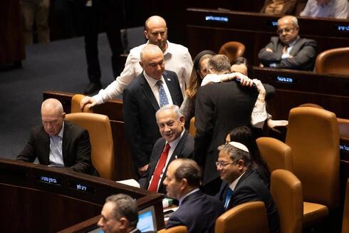 Líderes de la coalición durante la votación en la Knesset. 