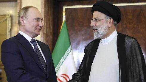 Vladimir Putin y Ebrahim Raisi. 