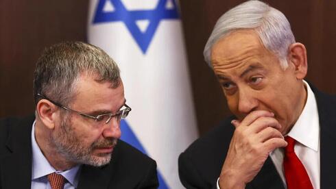El primer ministro de Israel, Benjamin Netanyahu y el ministro de Justicia, Yariv Levin.