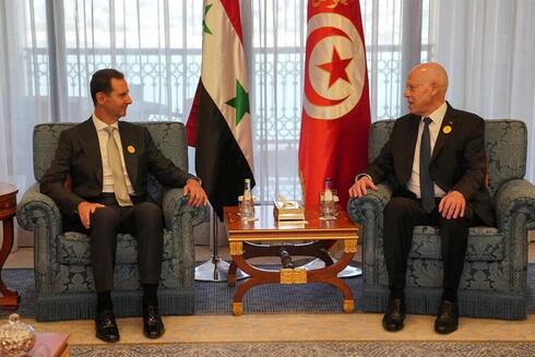 El presidente sirio y su homólogo tunecino. (AFP / Página de Facebook de la presidencia siria) El presidente sirio y su homólogo tunecino.