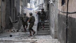 Combatientes de la 36ª División en el barrio de Zeitoun. 
